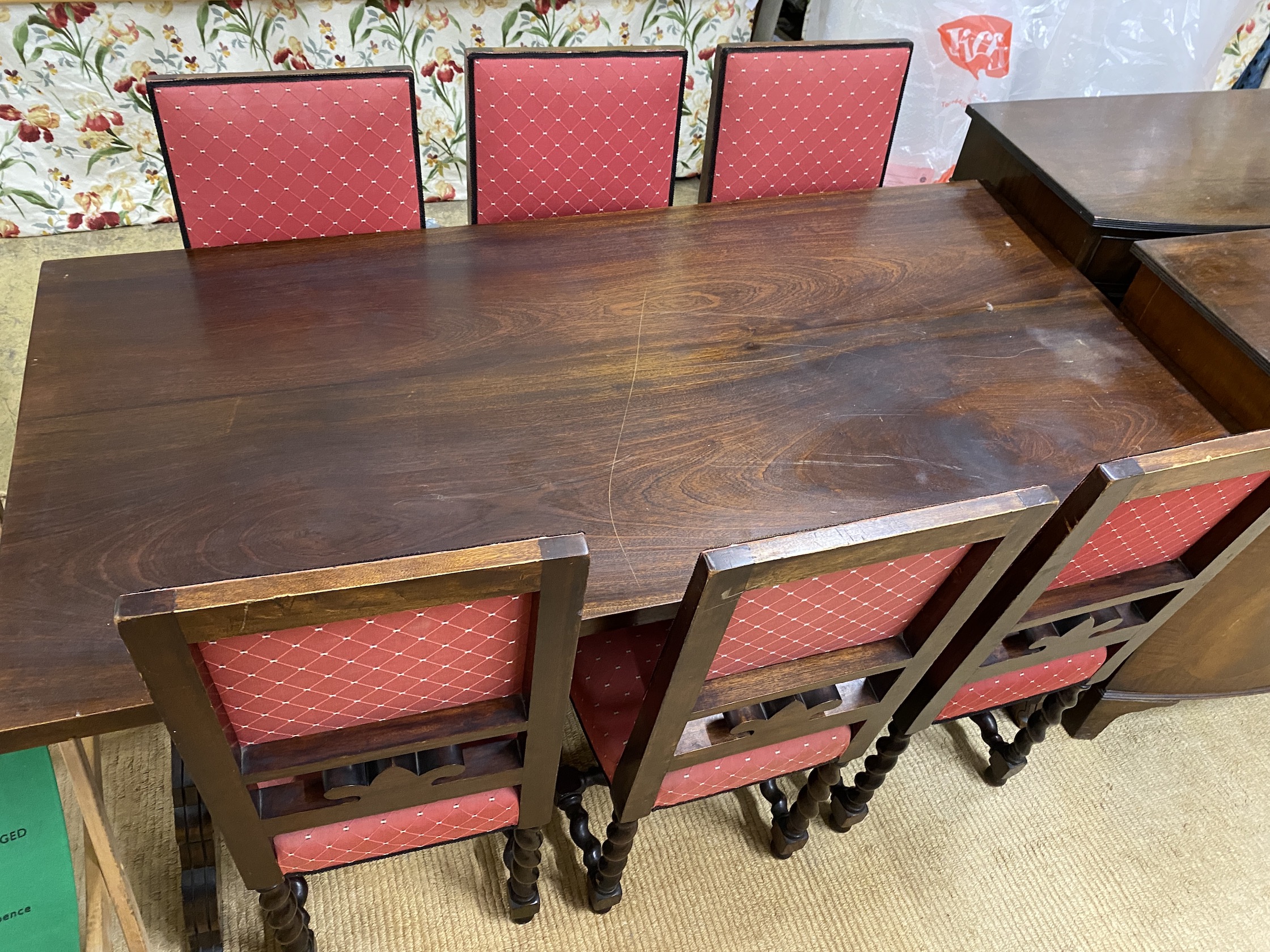 A Spanish style walnut rectangular refectory table, length 168cm, depth 84cm, height 78cm and six matching chairs